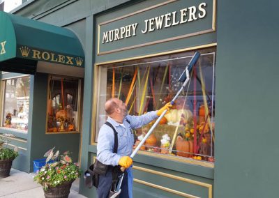 Cleaning the Windows of Murphy's Jewlers